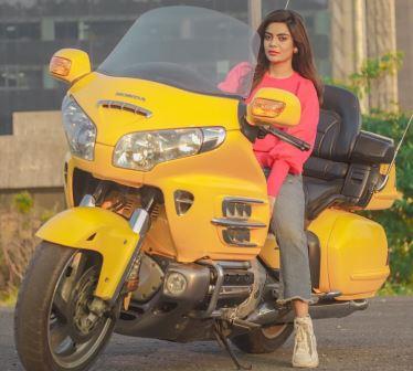 ankita khare riding bike